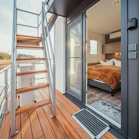 Semesterbostad Schwimmendes Ferienhaus Cosy - Spreewald *
